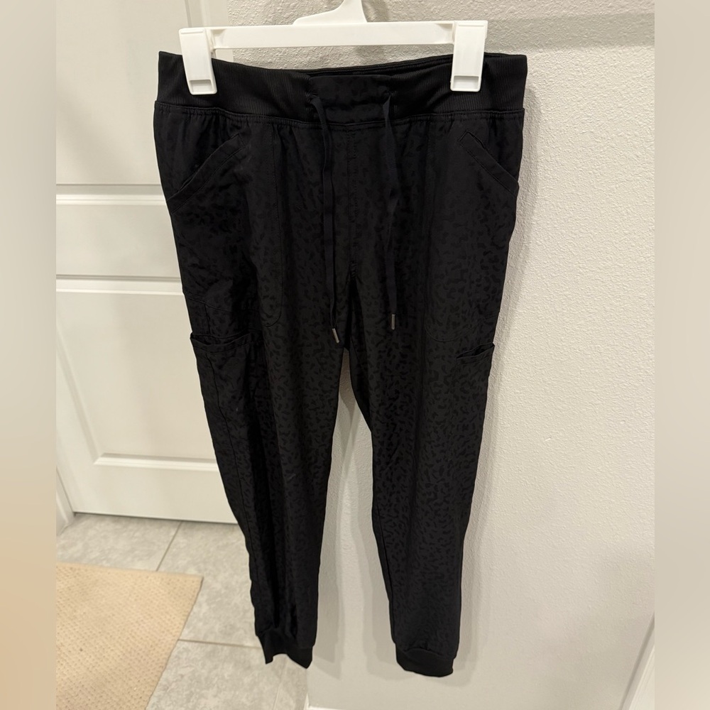 Ava Therese Black cheetah jogger scrub pants